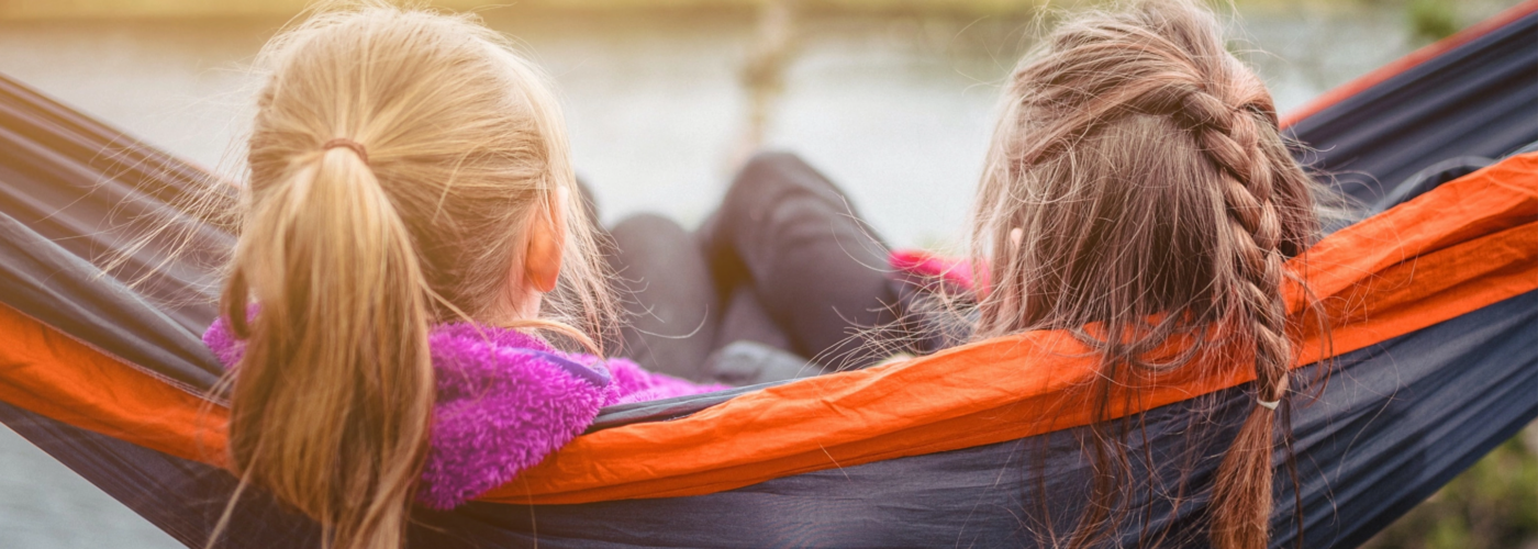 two girls in a hammock
